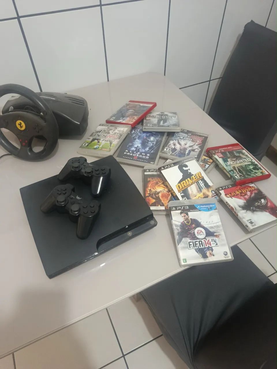 PS3 SLIM COM VOLANTE - Foto 4