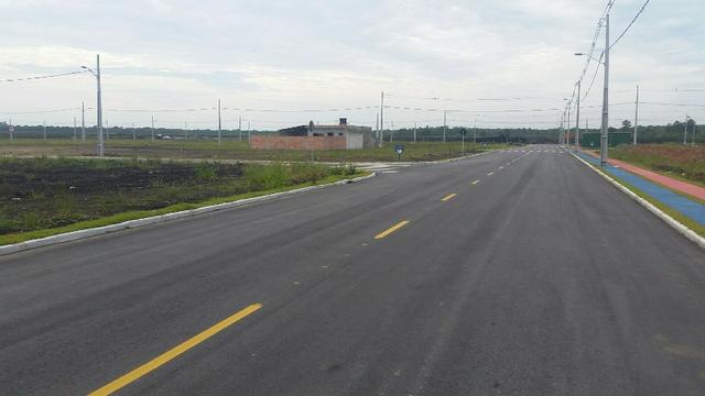Terreno com pequena entrada, loteamento todo asfaltado - Foto 7