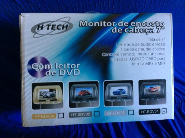 Encosto de cabeça p/ automóveis c/ DVD 7?