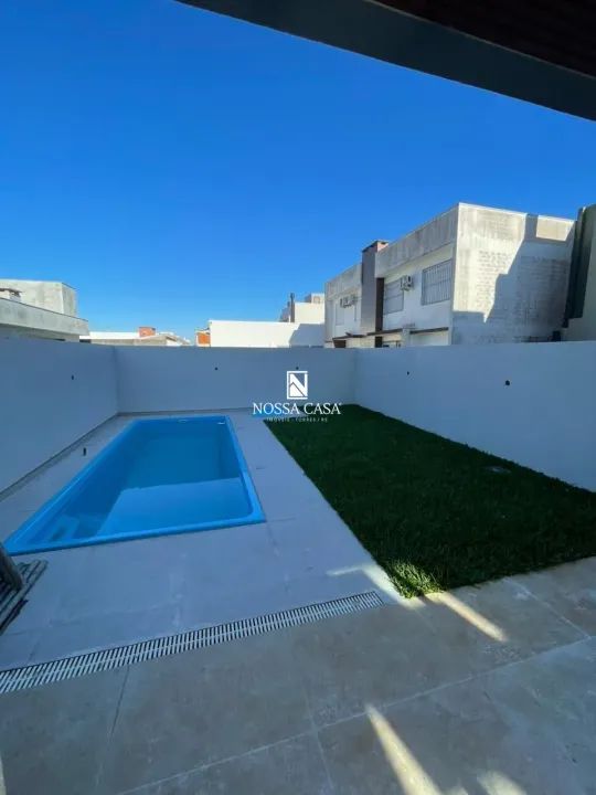 Sobrado geminado, com 3 quartos, sendo todos suítes, em Torres/RS. - Foto 3