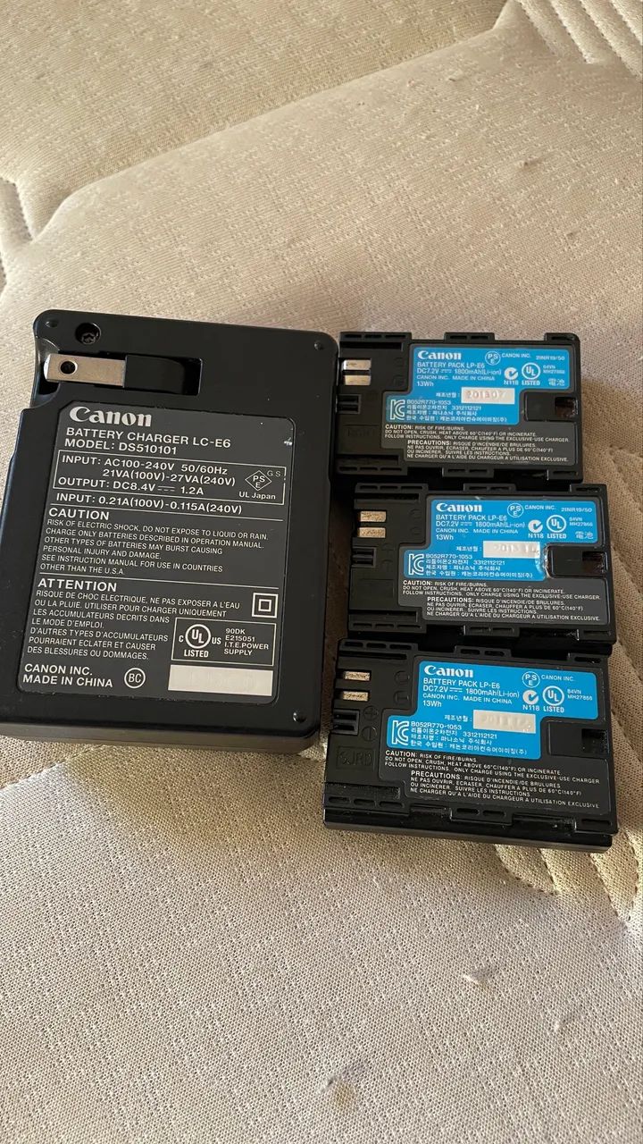 3 Baterias + 1 Carregador Cânon 