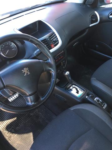 Peugeot 207 passion 2009 automático Fipe é 18mil to querendo nele 14.500 - Foto 3