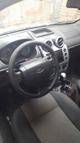 Vendo Ford fiesta senda ano 12/13 completo - Foto 5