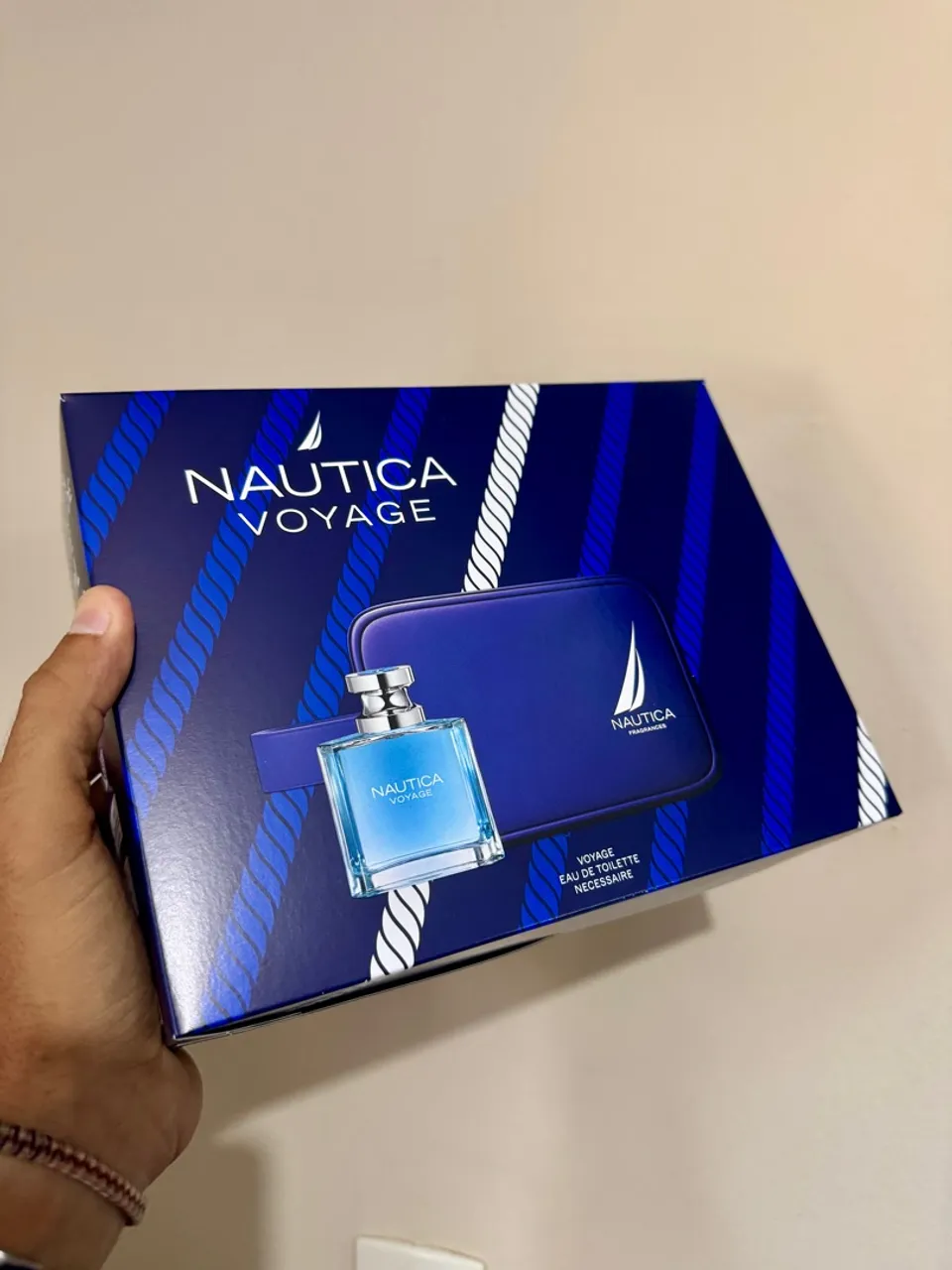 kit perfume náutica voyage edt 100ml + necessaire original lacrado adipec