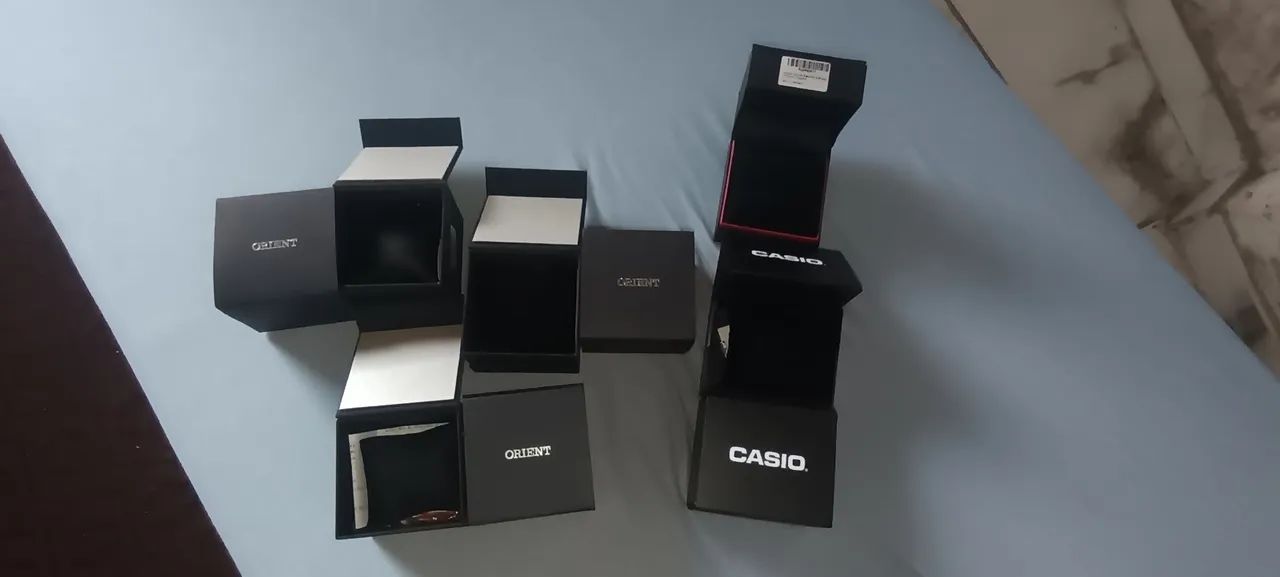 Caixa de relógio originais novas com almofadas, Casio, Technos e Orient  - Foto 3