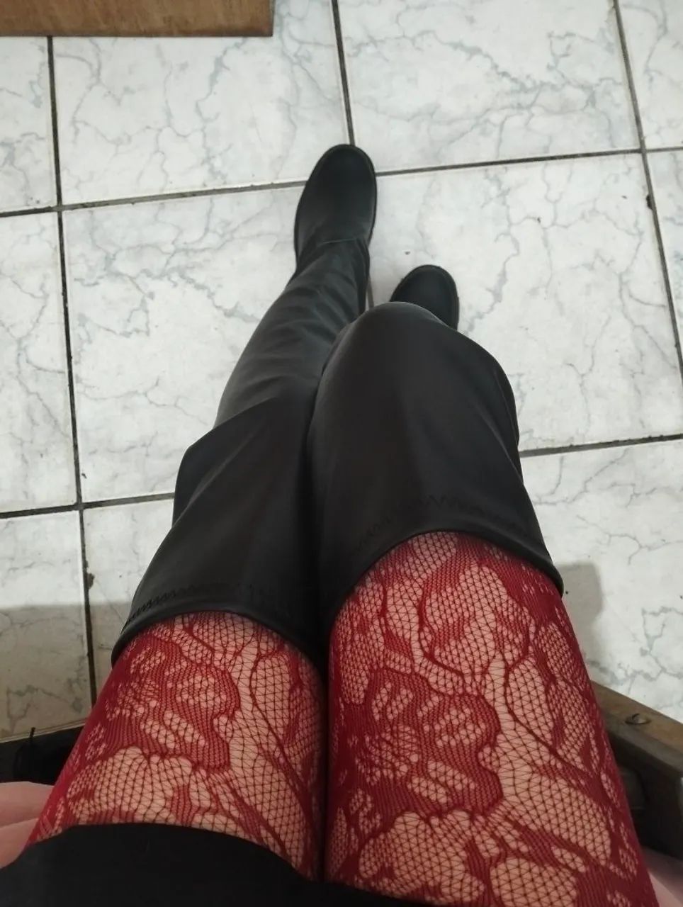 Bota de couro cano alto