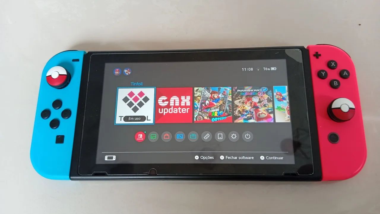 maron　スイッチ　Nintendo Nintendo Switch V2 Destravado Bateria Longa + Cartão 256GB + Case