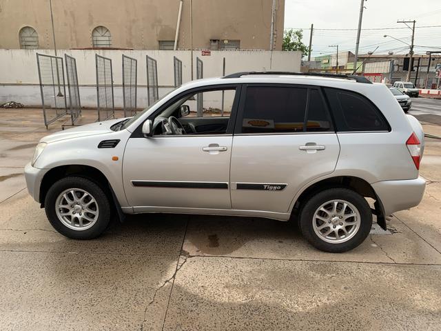 Tiggo 2.0 2010/11 manual completo quitado troco financio
