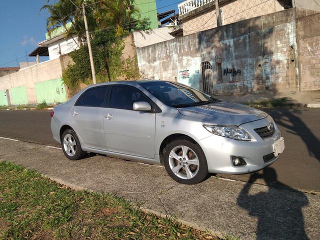 Vende ou troca corola 2010 $30.000