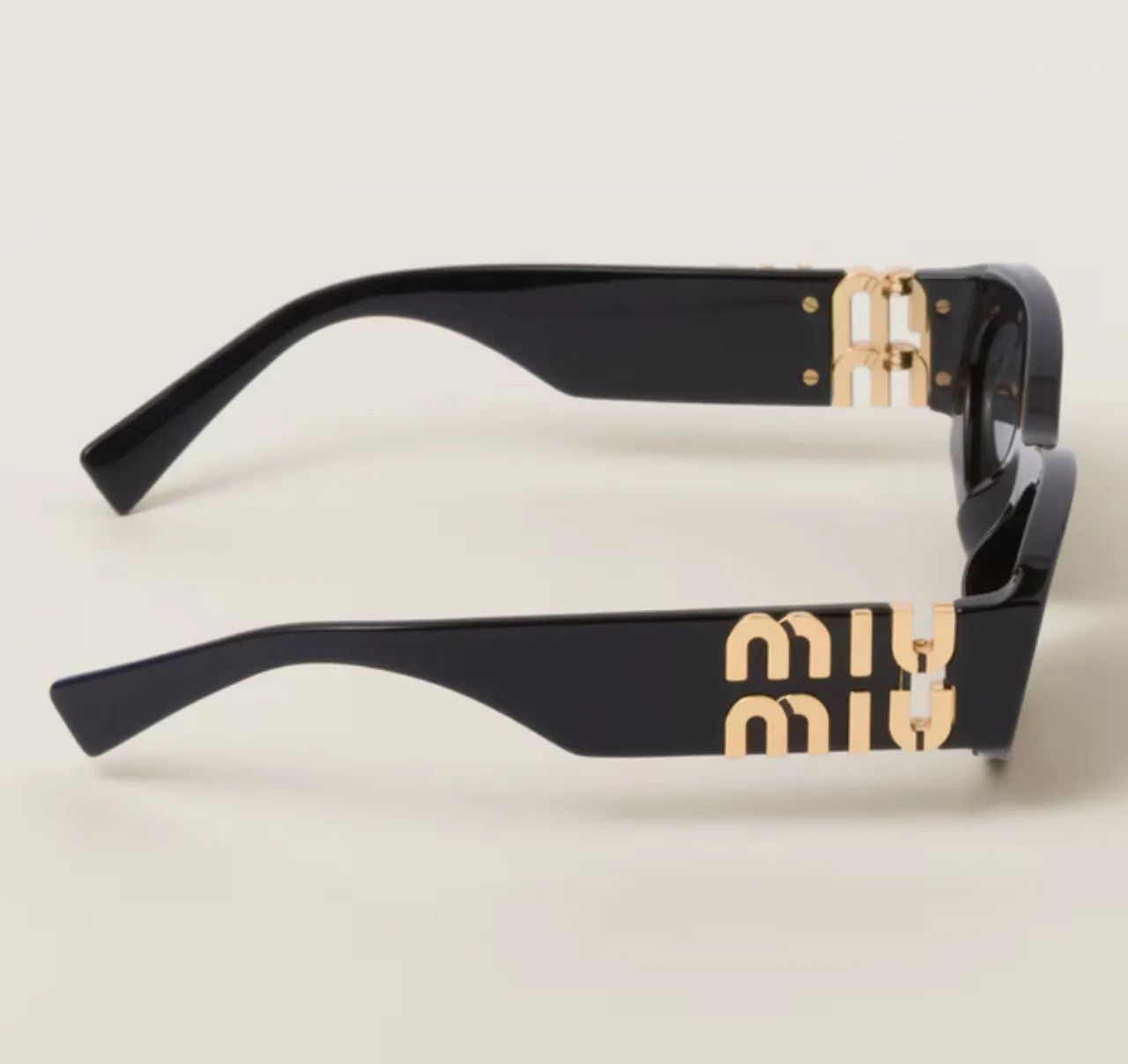Óculos de Sol MIU MIU Clássico Preto - Elegância e Estilo! - Foto 4