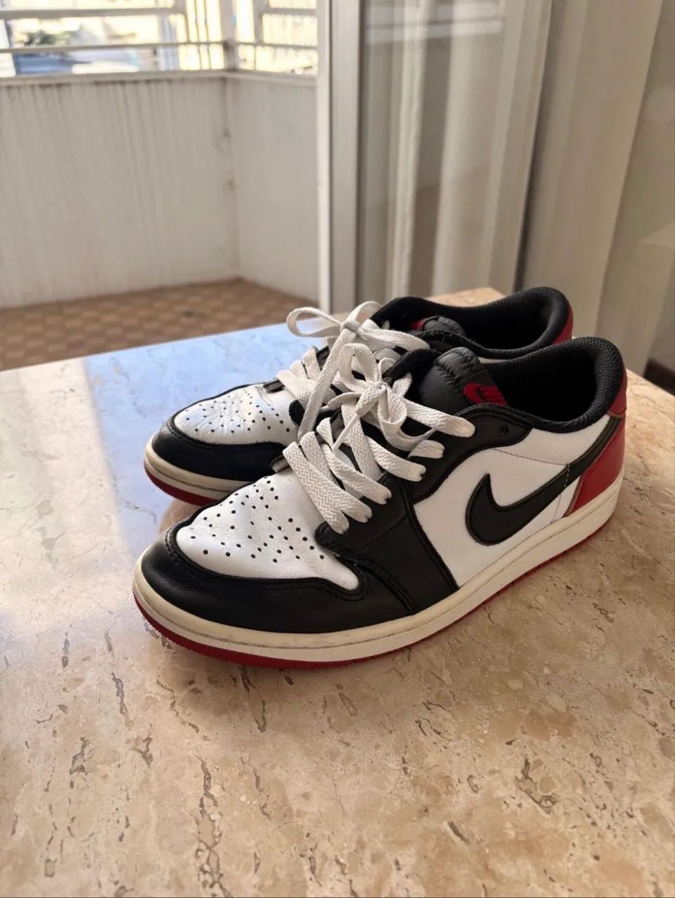 jordan 1 low og black toe 38