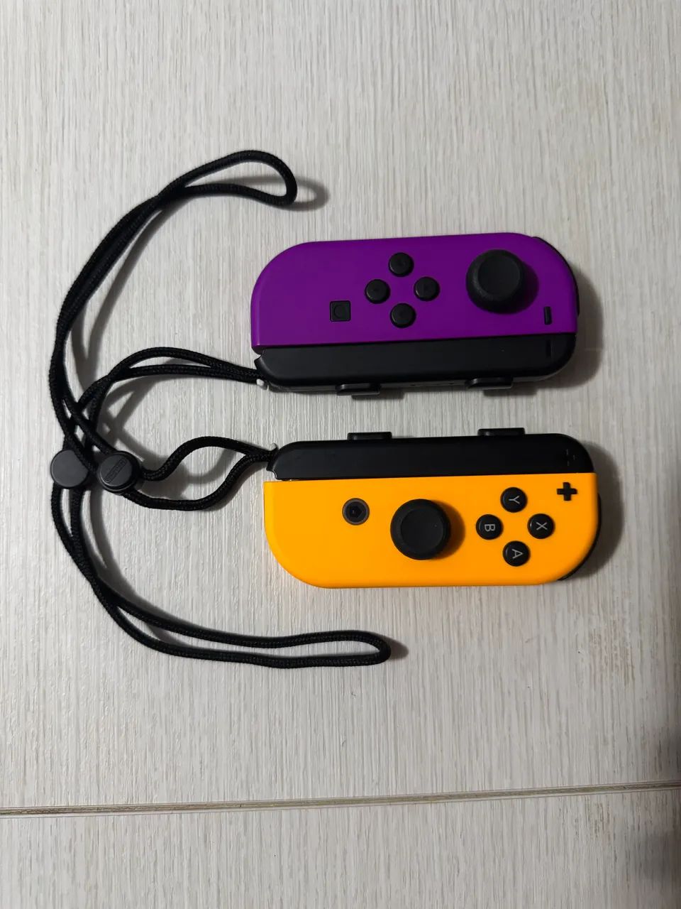 Joycons Nintendo Switch - Roxo e Laranja