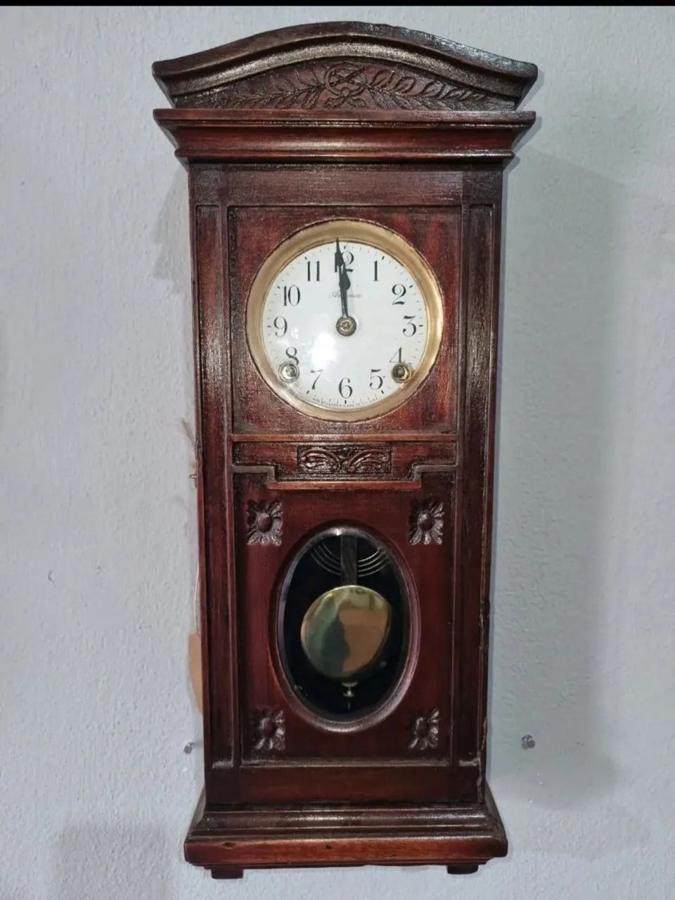 Antigo relógio de parede Ansonia. ( 50 cm)