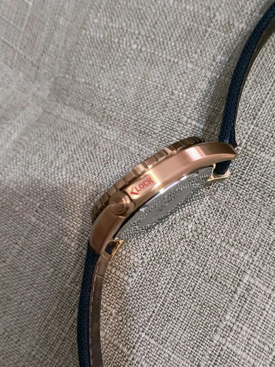 Relógio Nautica dourado fundo azul, pulseira nylon/couro.<br><br> - Foto 4