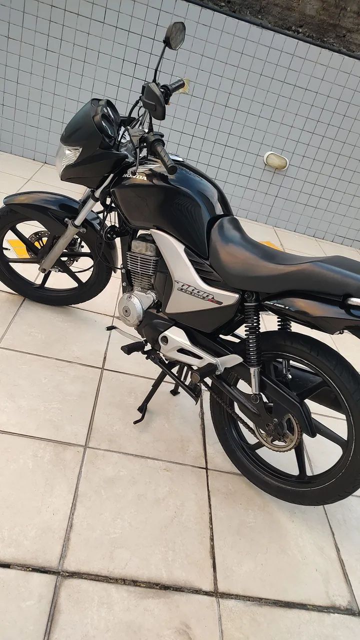 TITAN EX 150 BEM CONSERVADA.