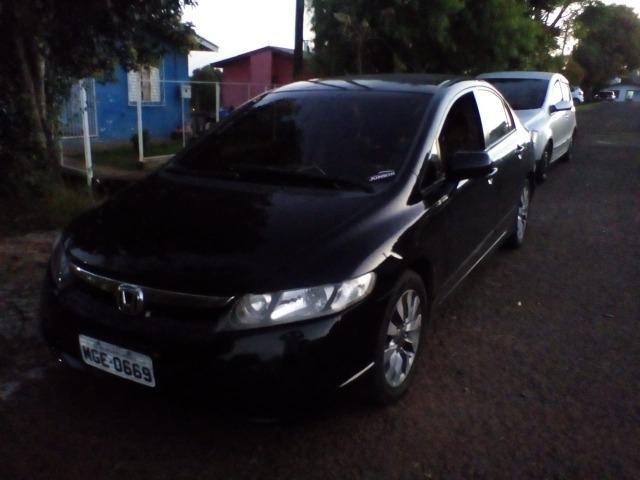 Civic 1.8 lxs manual banco de couro,flex,chave reserva completo de tudo