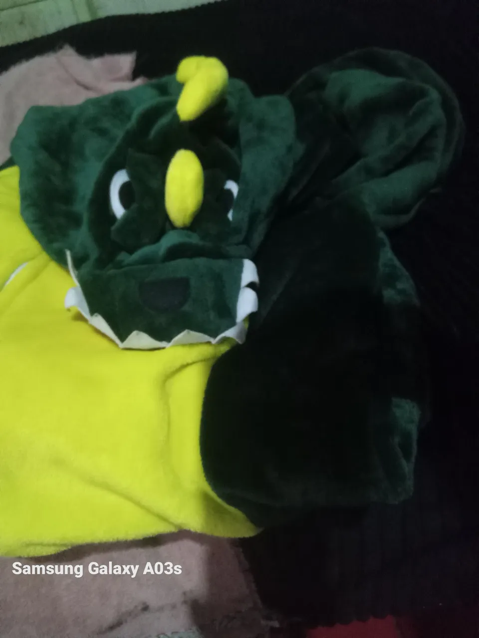 Macacão de dinossauro infantil