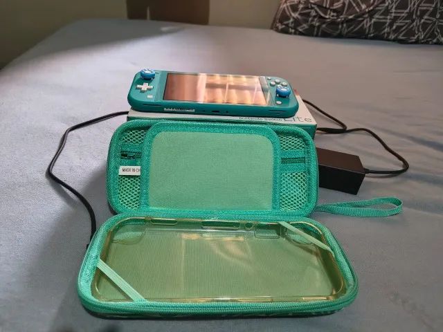 Nintendo Switch Lite Turquesa usado BLOQUEADO - Foto 2