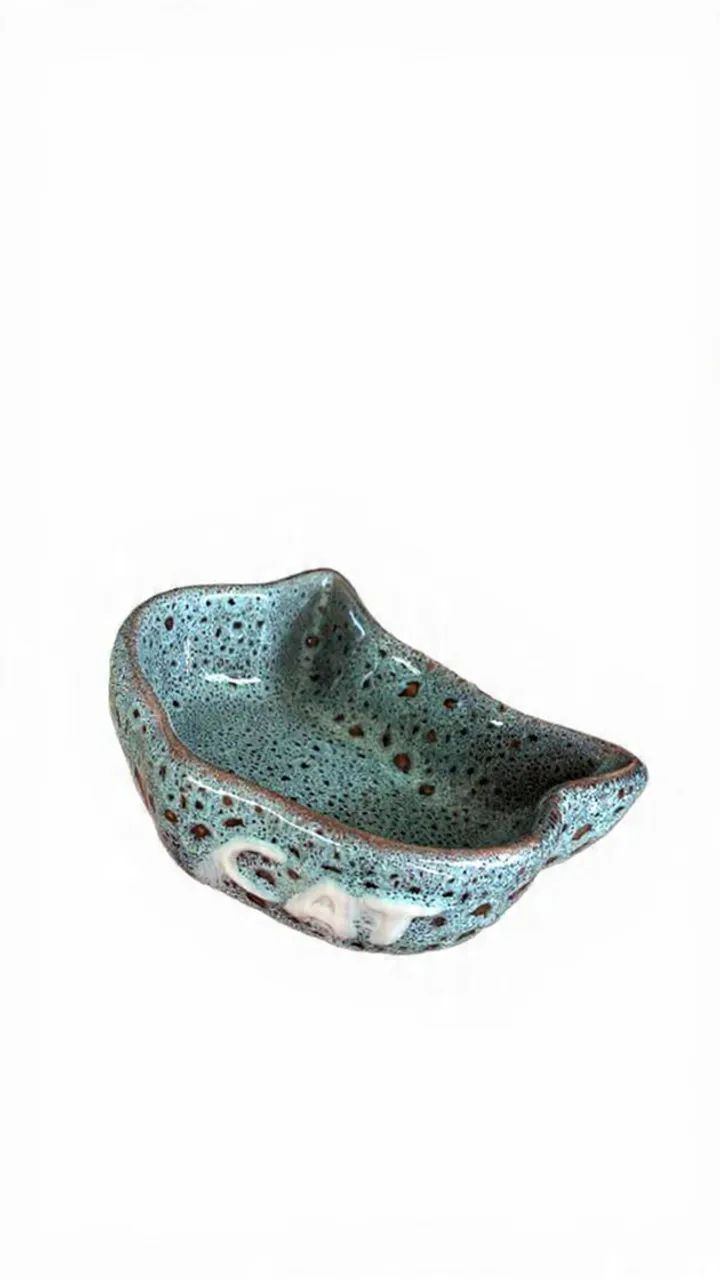 Pote de cerâmica para gato