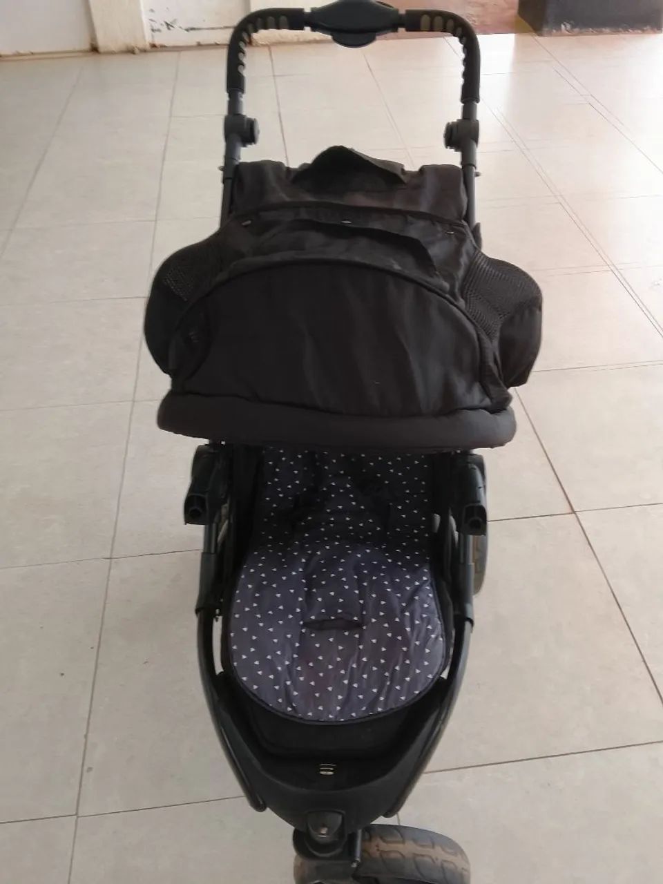Carrinho de bebe.