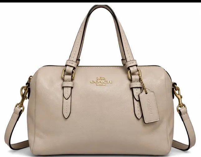 Bolsa coach original com código de veracidade 
