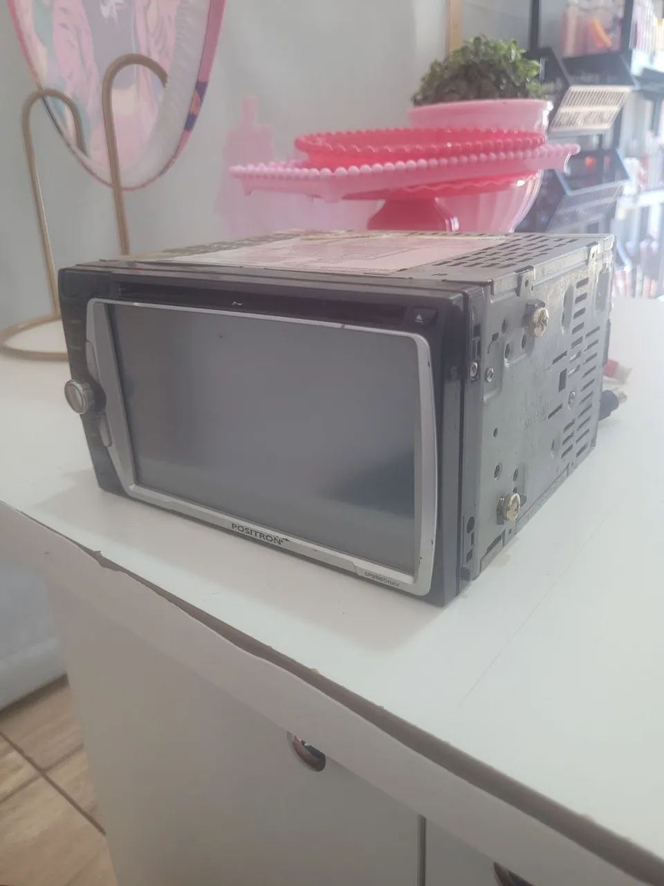 central multimídia automotiva 2 DIN marca Pósitron.