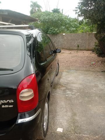 Vendo barbada ac carro menos valor com volta - Foto 7