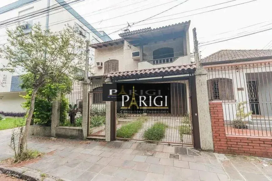 Casa com 4 dormitórios para alugar, 306 m² por R$ 7.857,00/mês - Passo d'Areia - Porto Ale