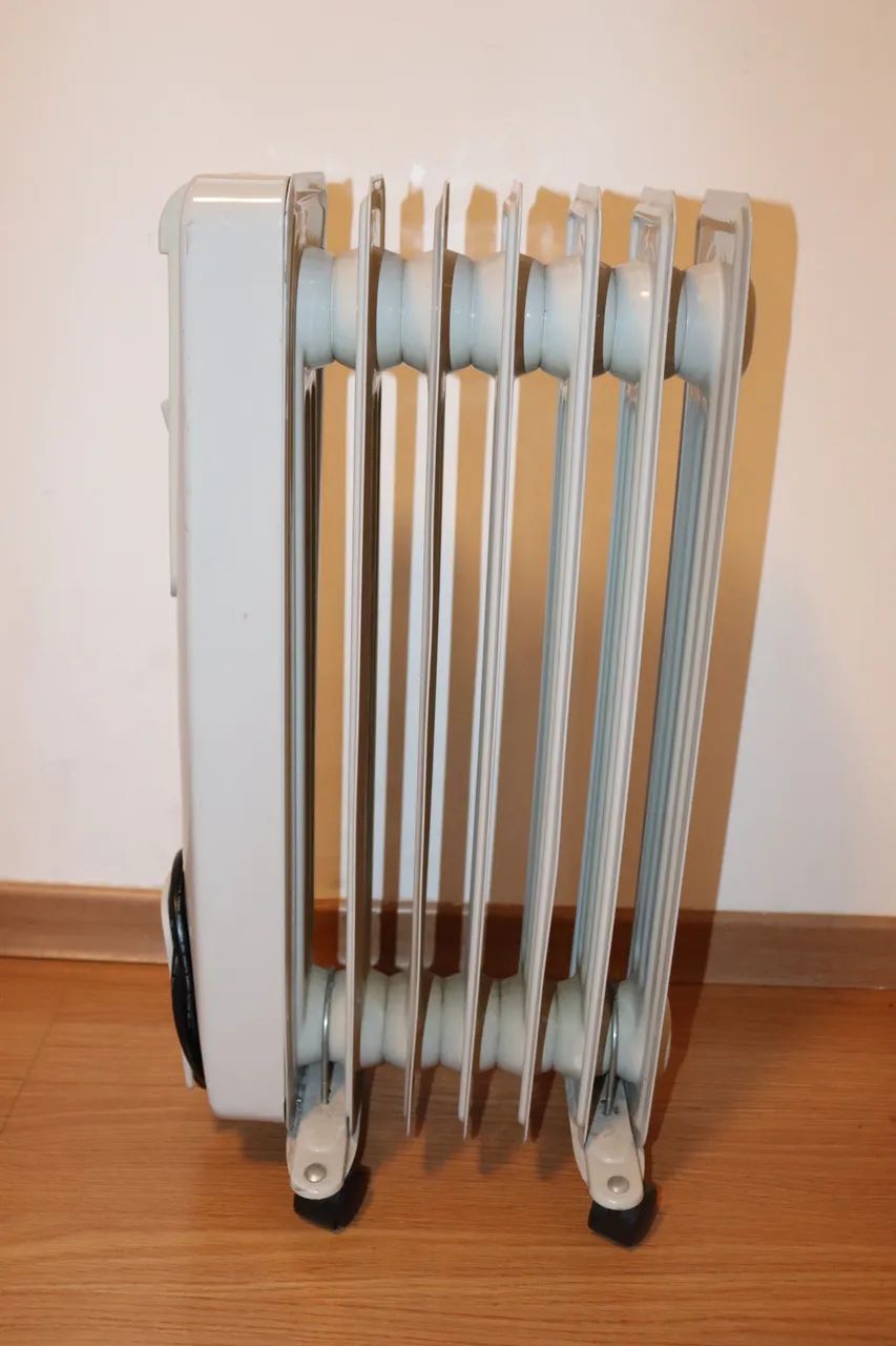 Aquecedor Britânia 1500 óleo 110 v - Foto 4