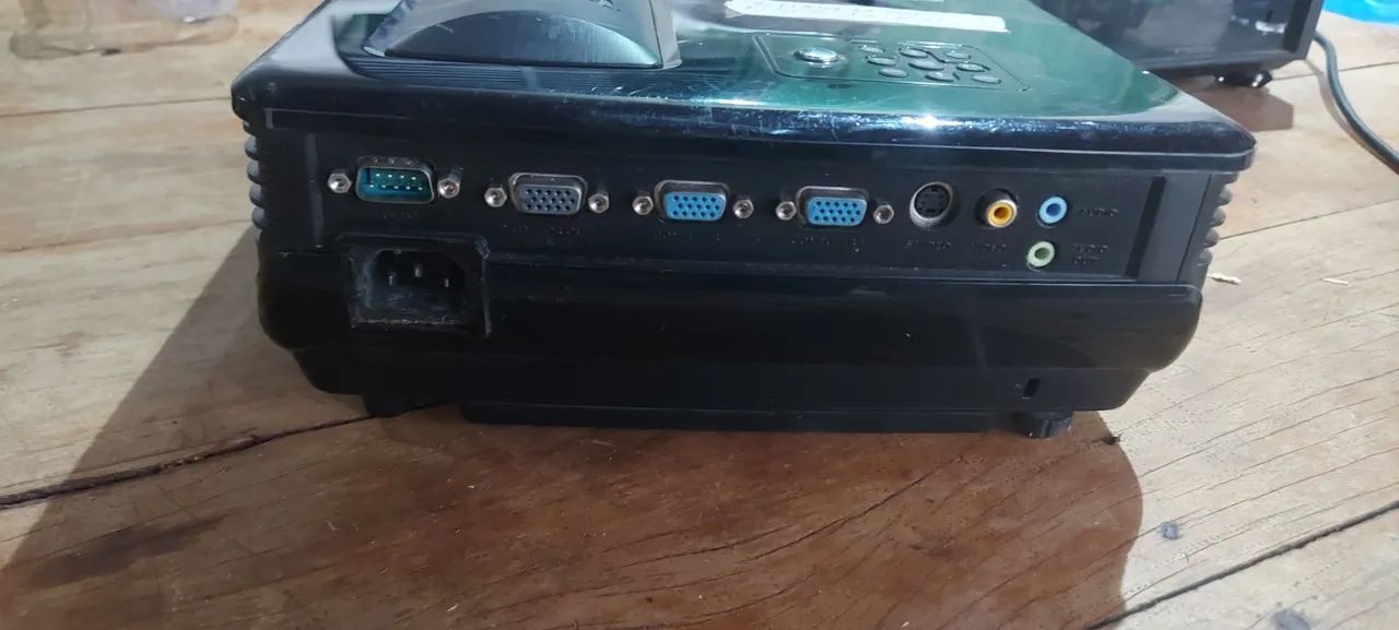 Benq projector model MP 515 has a spot in the corner of the screen64573372347651123