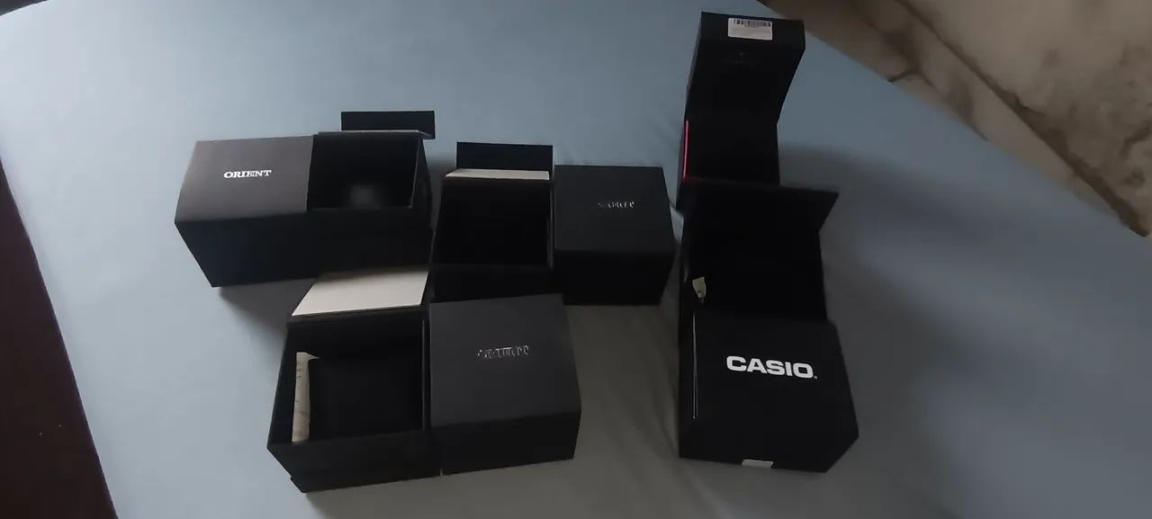 Caixa de relógio originais novas com almofadas, Casio, Technos e Orient  - Foto 4