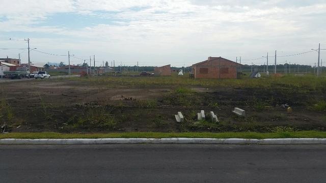 Terreno com pequena entrada, loteamento todo asfaltado - Foto 3