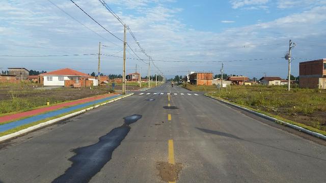 Terreno com pequena entrada, loteamento todo asfaltado