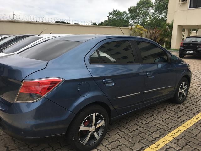 Já financiado - Vendo prisma Automático - Foto 4