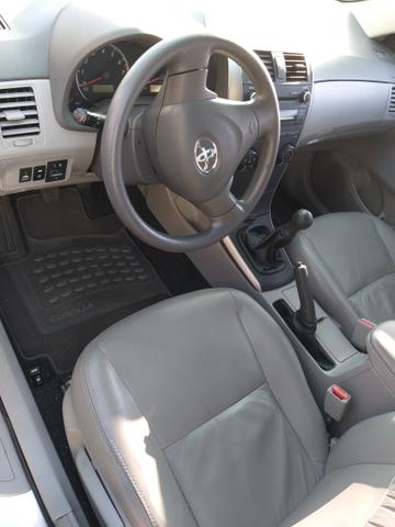 Vende ou troca corola 2010 $30.000 - Foto 6
