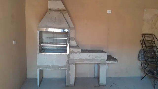 Churrasqueira pré moldada com fogão a lenha 
