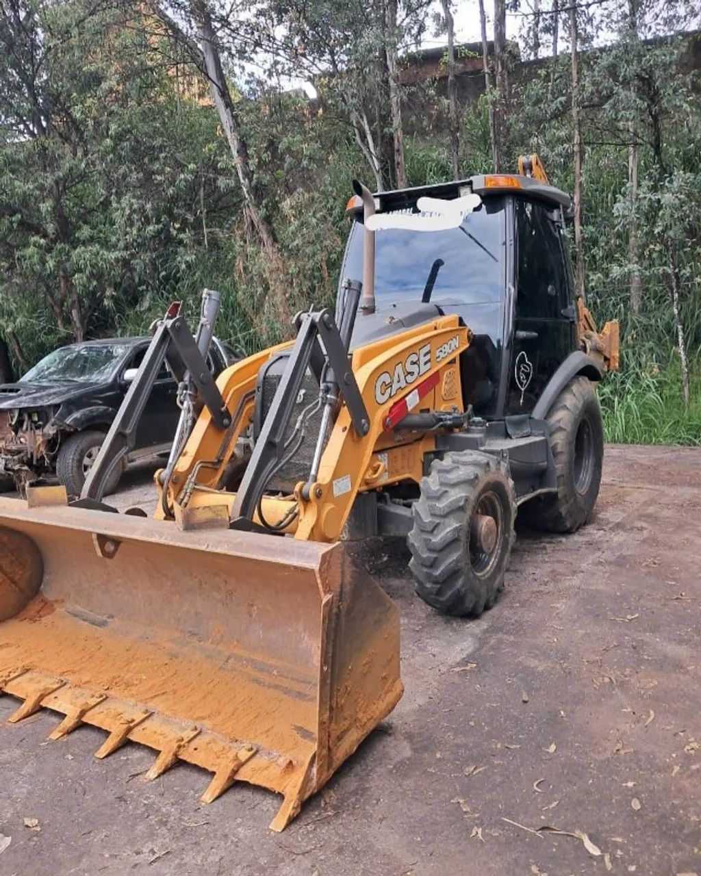 Retroescavadeira Case 580N