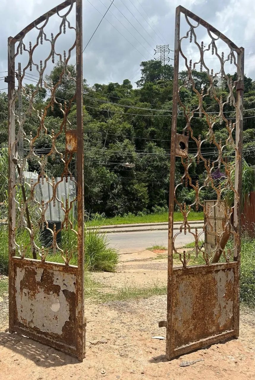 Ancient solid iron gate with two flags461932532219914241