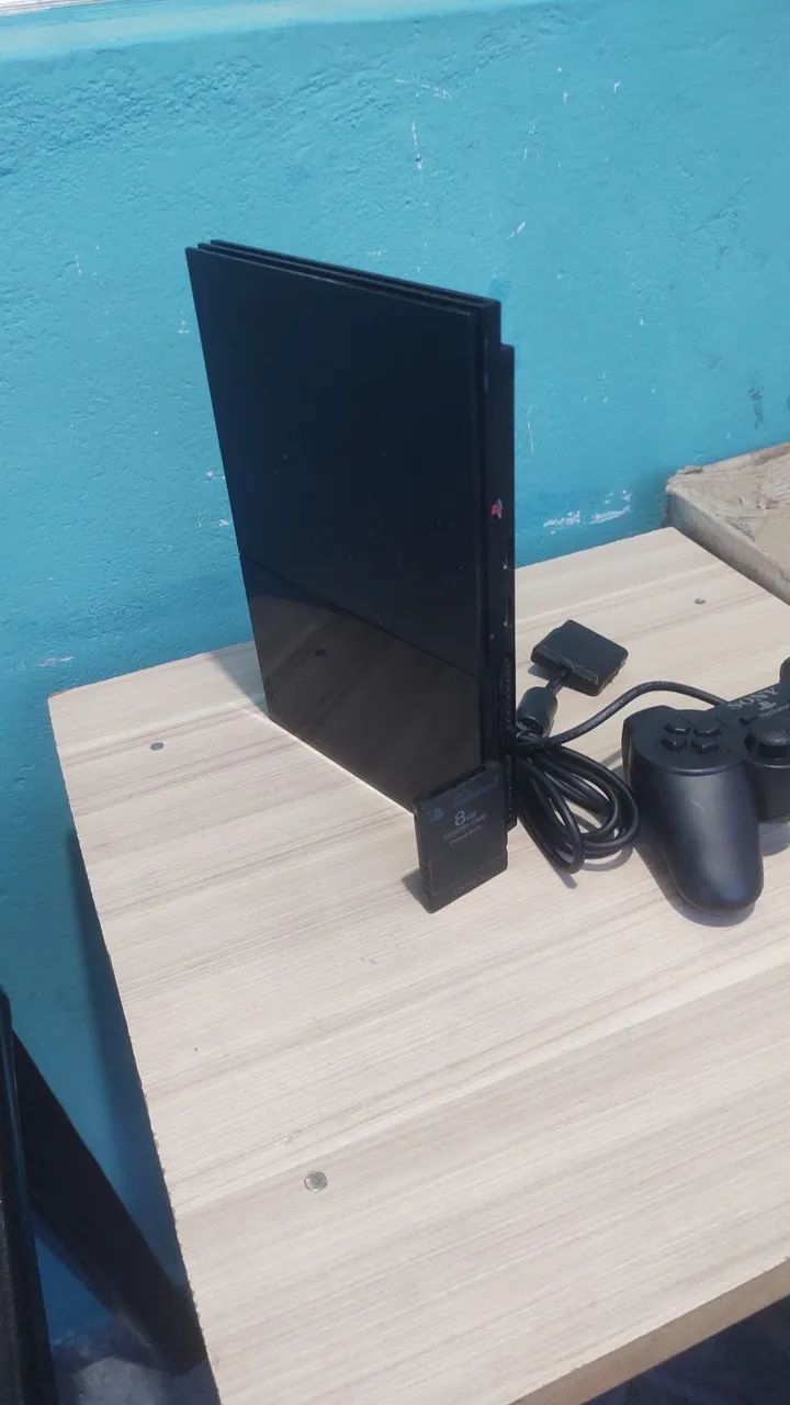 PS2 slim funcionando perfeitamente com memóricard e um controle e um jogo - Foto 2