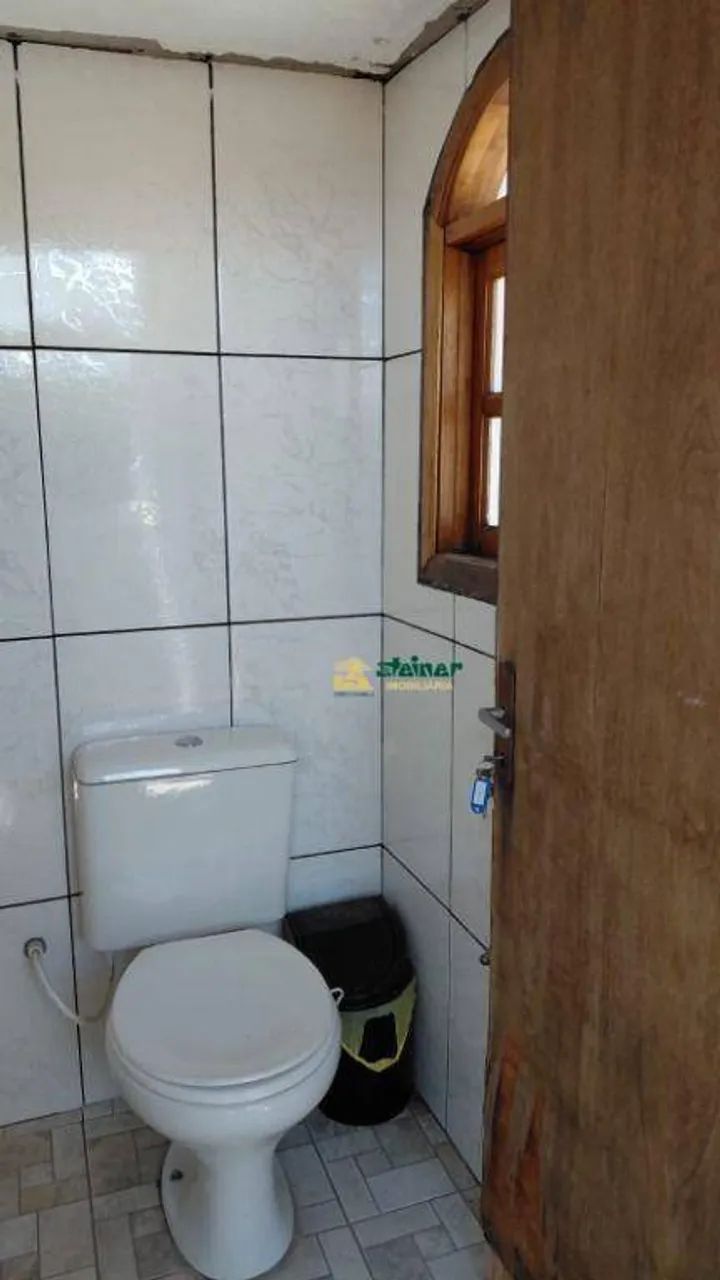 Casa com 3 dormitórios para alugar, 200 m² por R$ 4.679,99/mês - Parque Continental I - Gu - Foto 4