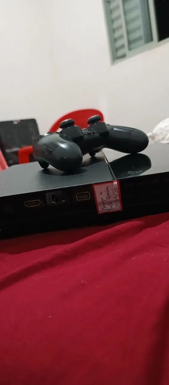 PS4 FAT COM DOIS JOGOS