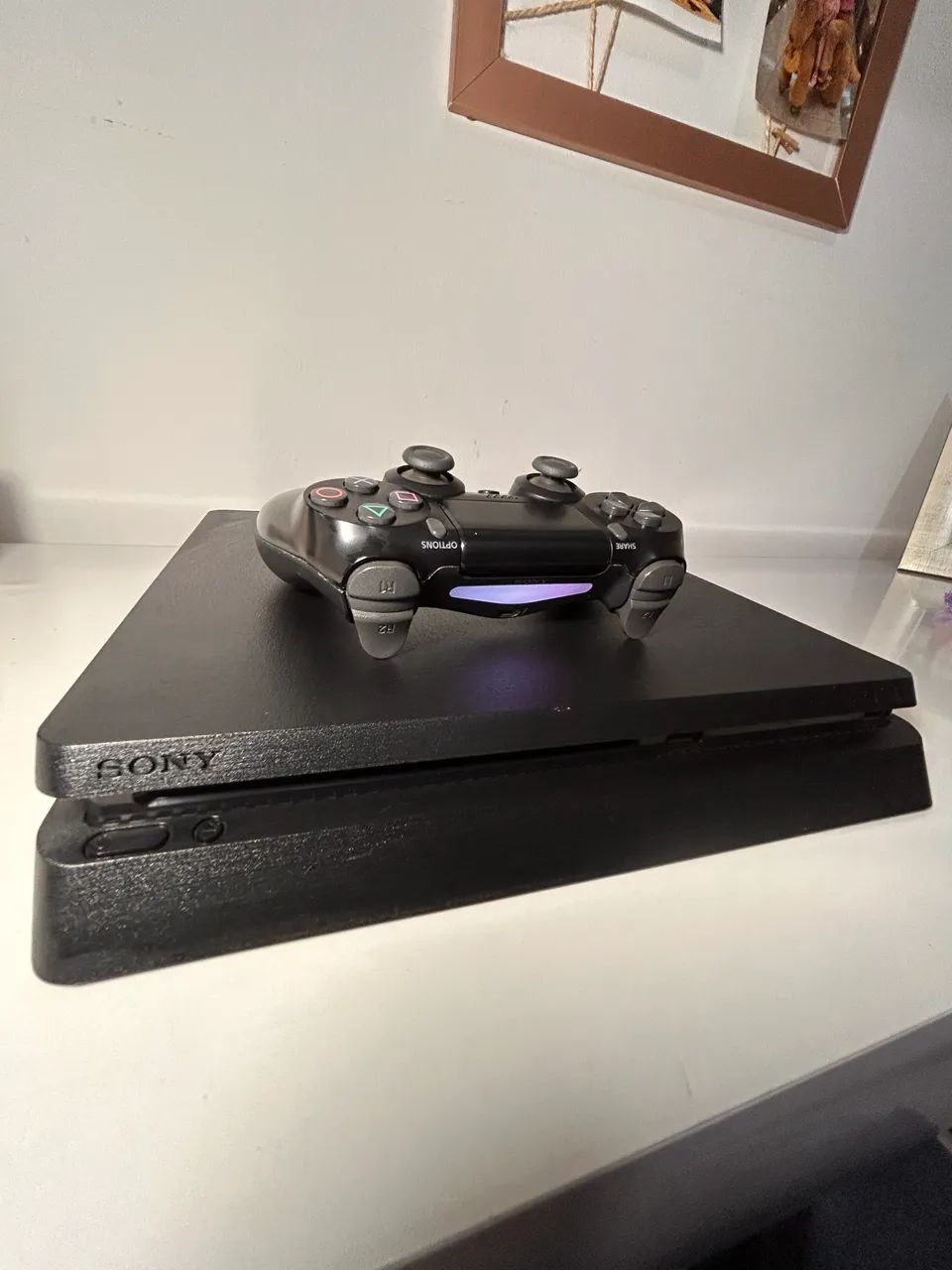 PS4 Slim versão de 1 tera 