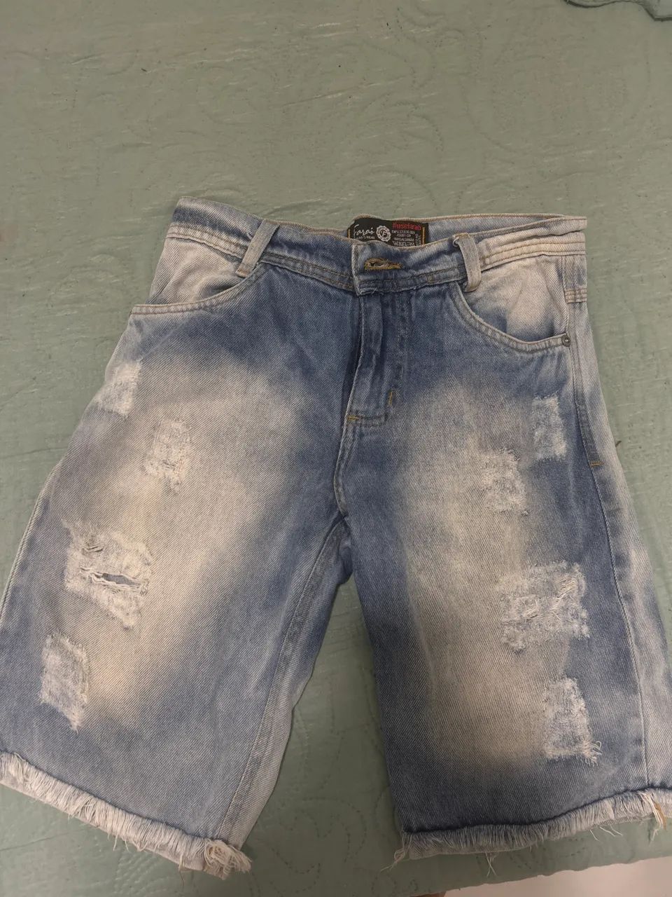 Bermuda jeans rasgada masculina 