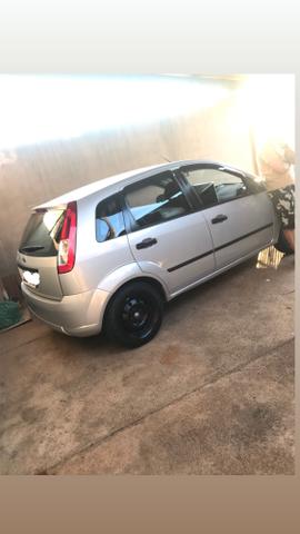 Vendo Fiesta Hatch 2010 flex $14.980
