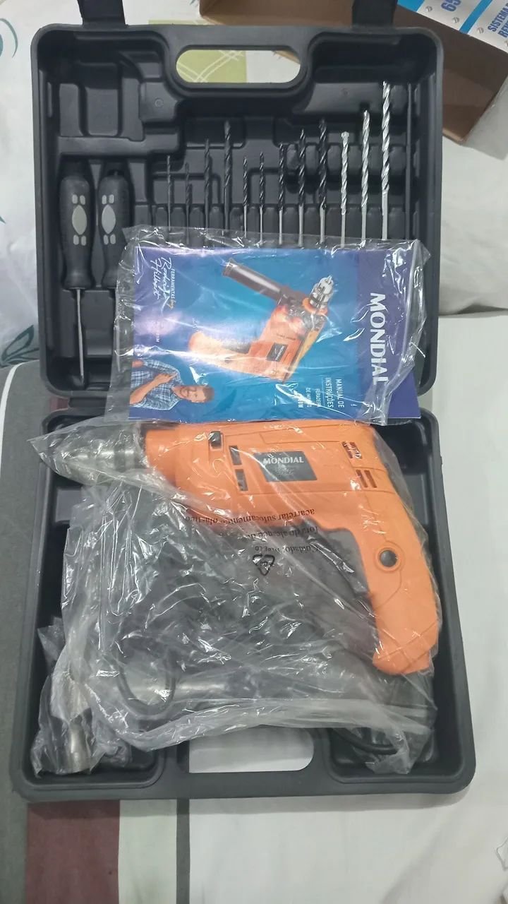 Furadeira Mondial 110V 650W com ferramentas e maleta (Nova) - Foto 2