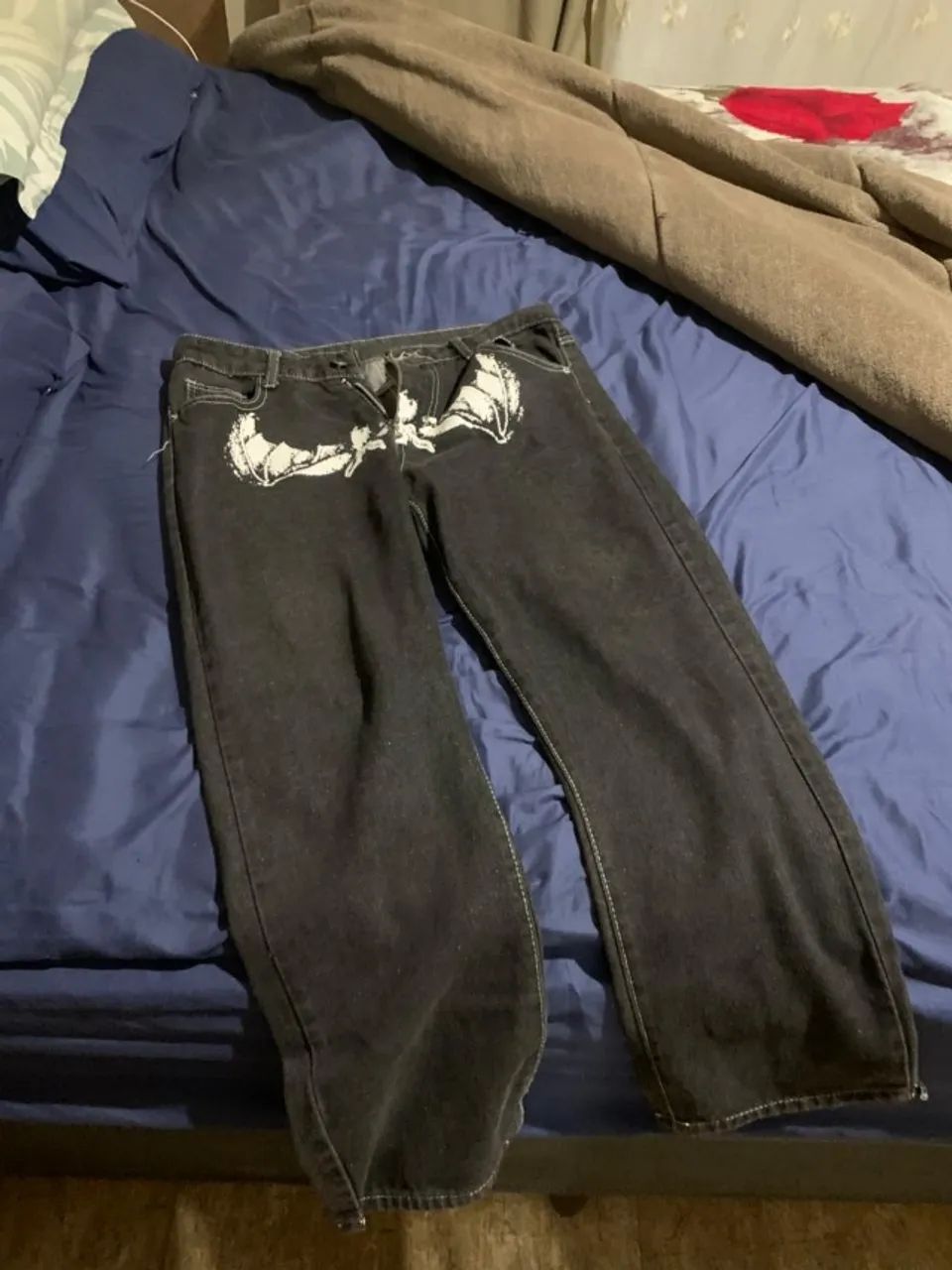 Calça jeans preta y2k morcego e michael mayers. 