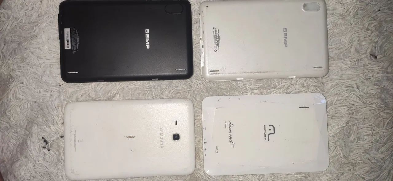 Quatro tablets, 3 funcionando perfeitamente e 1 que vai ate o logo da Multilaser e para.  - Foto 5