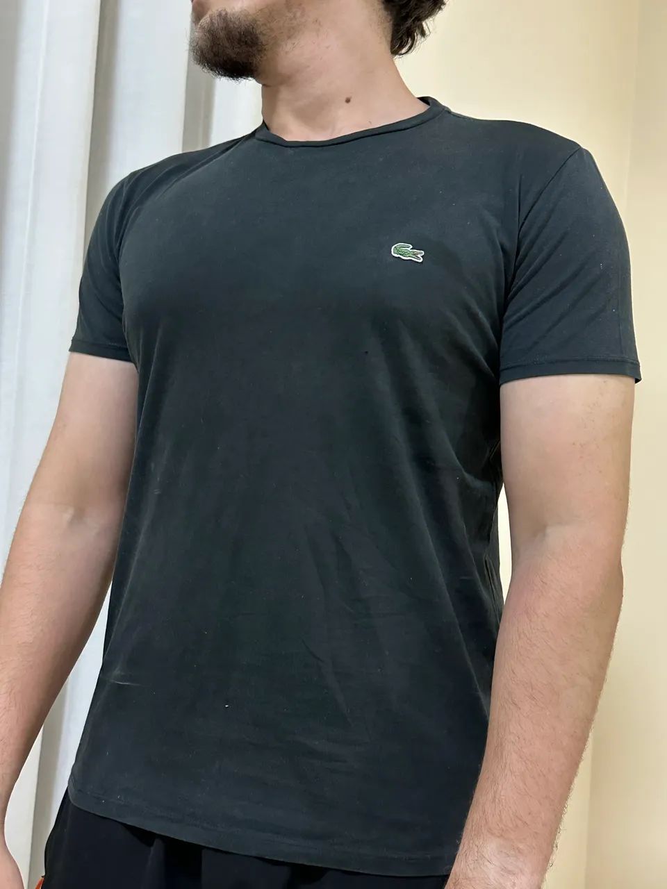 Camiseta Lacoste preta em perfeito estado P