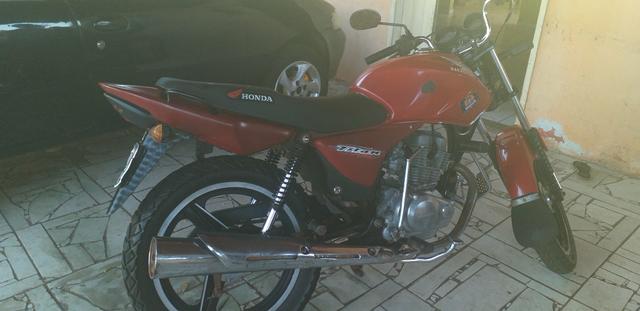 Titan 150 2005 pedal atrasada