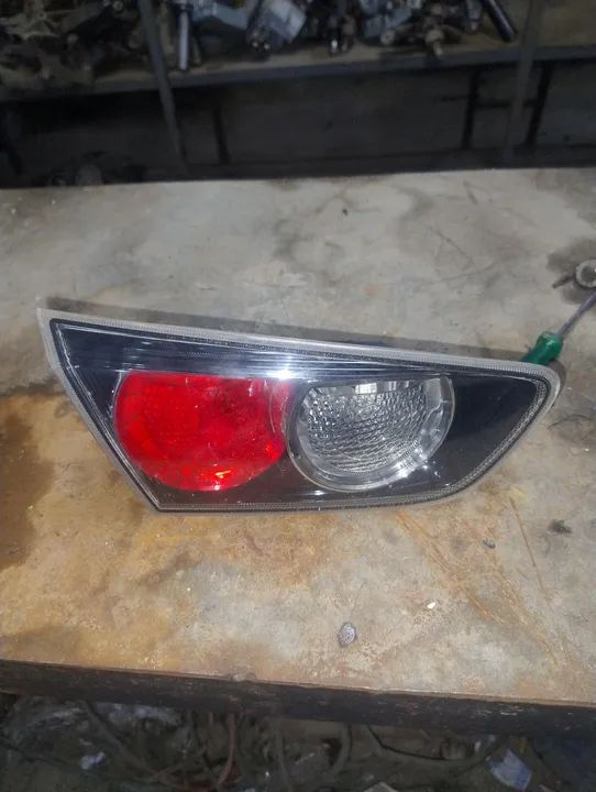lanterna da mala da Mitsubishi Lancer - Foto 2